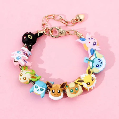 Bracelet with various cartoon character charms on a pink background